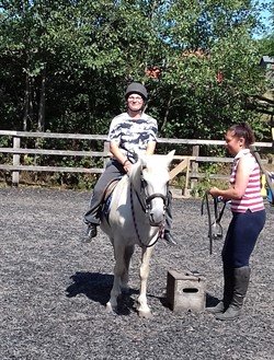 photo of carer horseriding