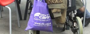 photo of a full care for the carers bag on a shopping cart