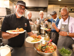 Man with a pan Robin Van Creveld carers cooking course