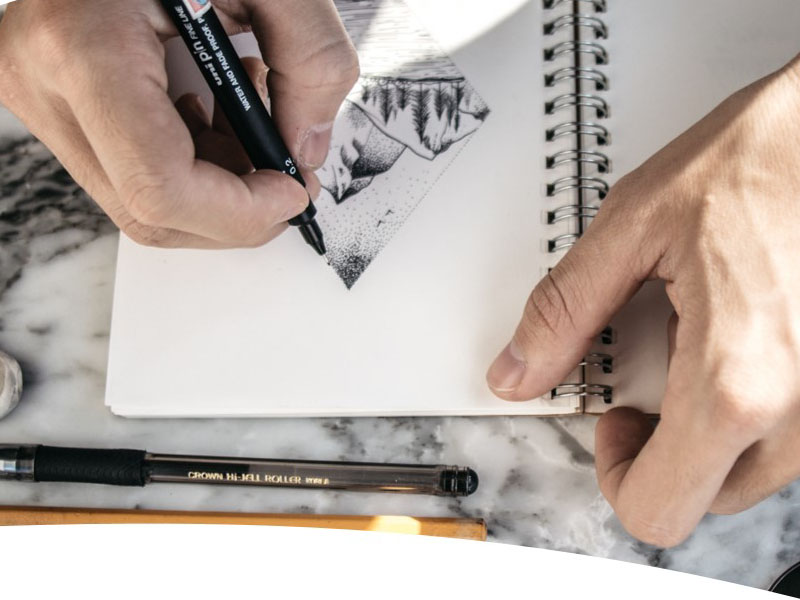 Image of hands doing a drawing