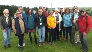 Group of walkers looking to camera