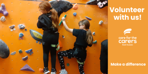 'Volunteer with us' banner with image of young carers on climbing wall