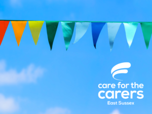 Colourful bunting in a blue sky, with the CFTC logo bottom right