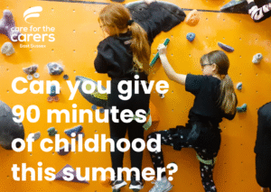 2 young carers on an orange climbing wall